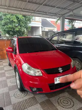 Suzuki Sx4 Xover AT merah 2008 Low Km