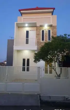 Rumah cantik 2 lantai DP minim Wiguna