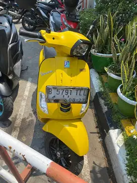Over kredit vespa s125 tahun 2022