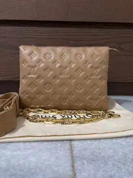 LV Coussin PM repriced