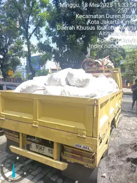 Angkut puing dan buang sampah