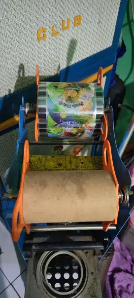 Mesin press untuk cup minuman