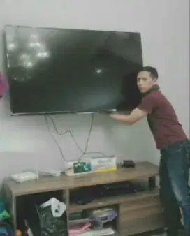 pasang dan jual bracket buat gantungan tv led lcd di tembok kuat kokoh