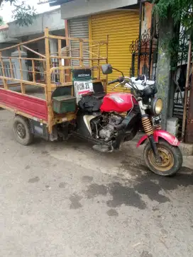 Motor roda tiga nozomi
