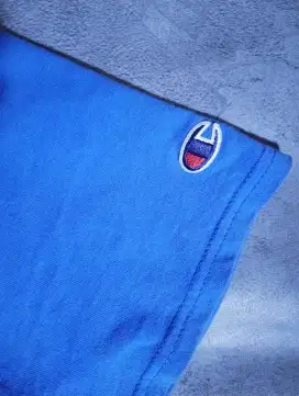 Kaos Champions biru