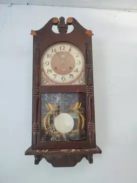 Jam dinding jadul merk lotus lobang dua
