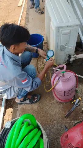 Servis AC bergaransi
