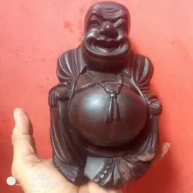 Patung kayu Budha julai