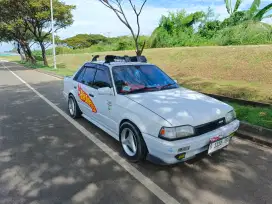 Mazda 323 elite putih