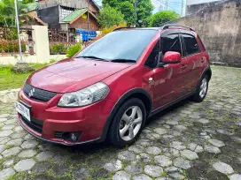 Warna unik, suzuki SX4 MT 2009 merah maroon