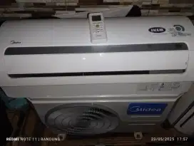 Ac bekas midea r410a  1/2pk +pasang Garansi