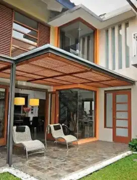 Kanopi atap kaca rangka besi hollo galvanis