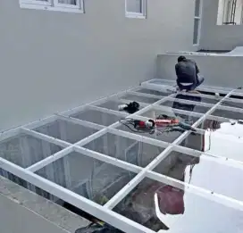 Kanopi atap kaca rangka besi holloh