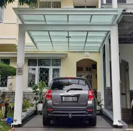 Kanopi atap kaca rangka besi