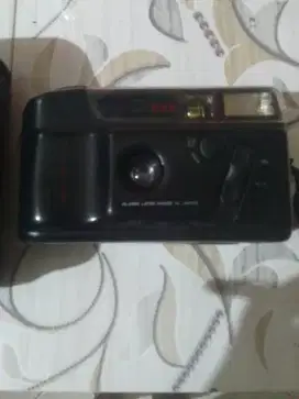 Tustel merk Nova, 35 mm Motor, Glass Lens Made in Japan, Fokus F 3,5