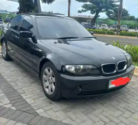 BMW hitam 318i  dijual nego santai