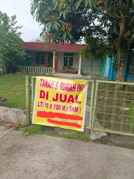 Tanah dan bangunan LT 1000m2 pinggir jalan raya