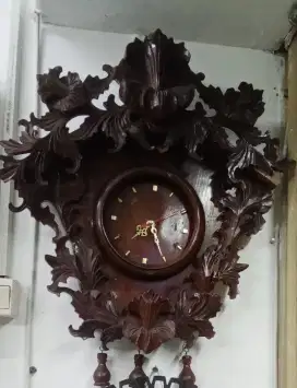 Jam dinding ukiran jepara