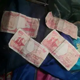 Koleksi uang 100 perahu pinsi nomer seri apik