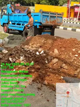 Tanah merah campur pengurugan buang puing sampah urug urugan