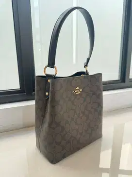 Tas coach jinjing