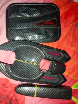Pelindung handle sigra