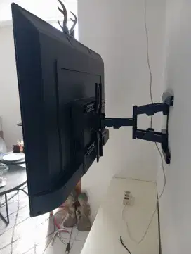 Bracket Tv plus pasang