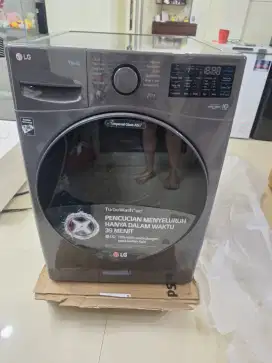 Mesin cuci front loading 15kg merk lg barang baru beli