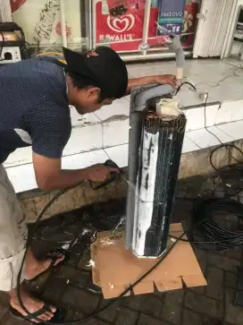 Jasa servis AC kulkas frezer showcase mesin cuci dan bongkar pasang AC
