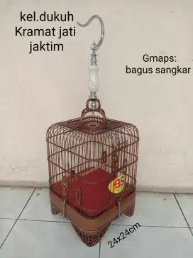 Sangkar oval ukir burcil