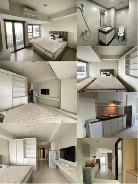 disewakan apartemen orange county lippo cikarang harga murah