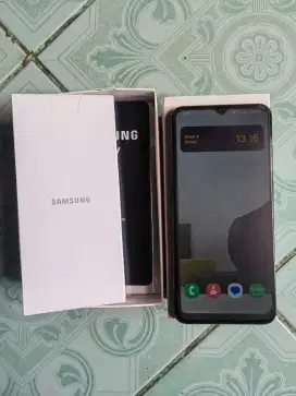 Samsung A04e + Charger