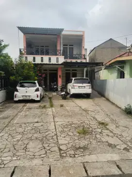 Dijual rumah tingkat + 2 kontrakan