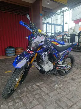 Minerva model trail bermesin tiger revo