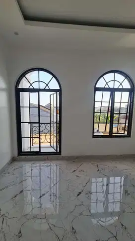 Rumah Desain Amerika klasik Tengah Kota Makassar