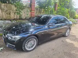 BMW 320i Full Hitam Sedan