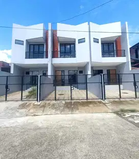 Rumah baru model minimalis tropis dalam komplek elite di Cinere Depok