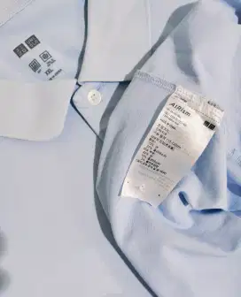Kaos kerah soft blue Uniqlo Airsm
