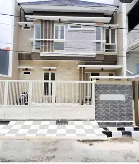 Rumah di Babatan Pantai Timur