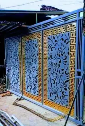 Pagar gerbang cetting laser moderen terbaru bergeransi