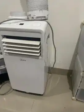 AC PORTABLE MIDEA 1/2 PK