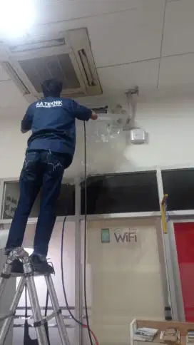 Jasa servis AC kulkas frezer showcase mesin cuci dan bongkar pasang AC