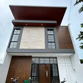 dijual rumah MODERN TROPICAL. lebar 8 di sutorejo
