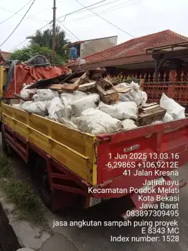 Jasa buang puing tanah