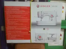 Di jual mesin jahit portable singer
