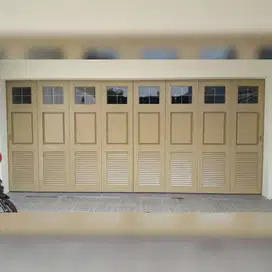 Pintu Garasi Sliding Tikung Otomatis