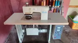 Mesin jahit Laser