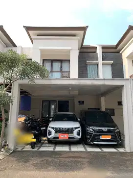 Di jual rumah modern di Podomoro Park harga di bawah pasar.