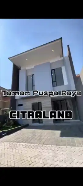 Modern minimalis . rumah di Taman Puspa Raya Citraland
