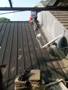 Tukang atap bocor